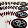 Wielnaaf stickers Toyota zwart met Rode rand